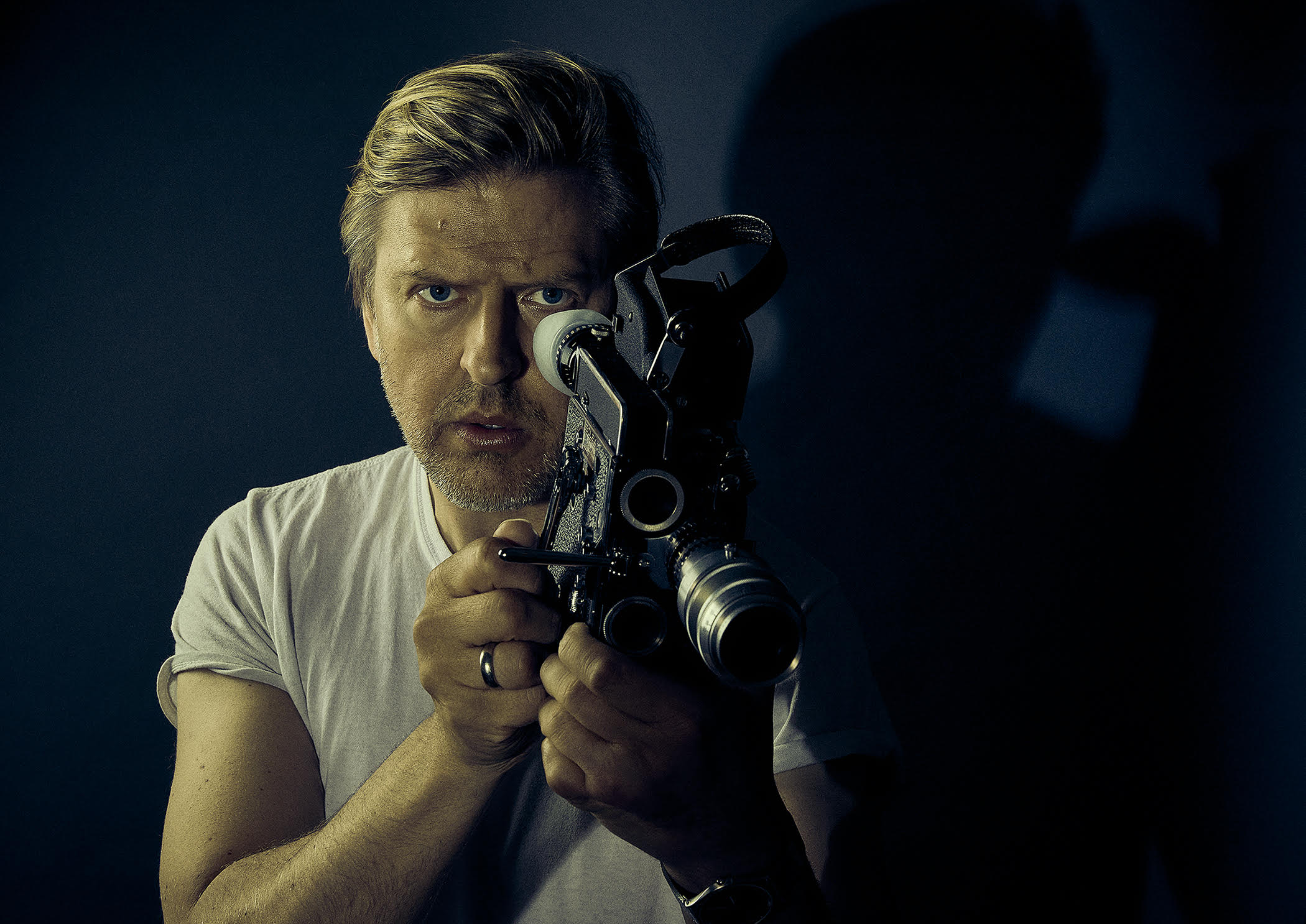 Studio portrait of Jayce with an old film